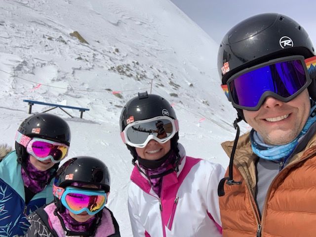 Nathan Lesley, M.D. and his family skiing